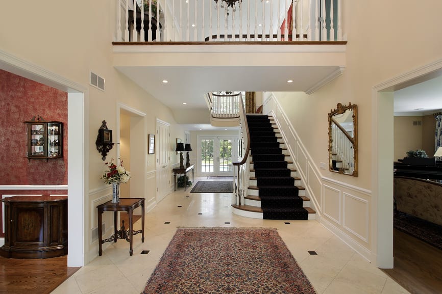 Large foyer in luxury home with second floor landing