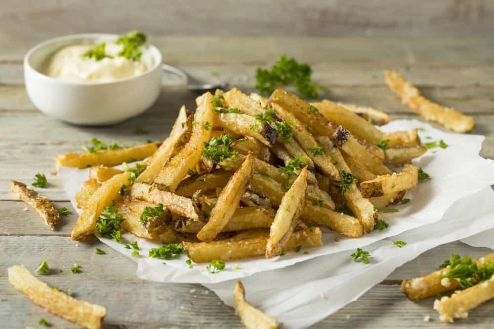 Homemade Parmesan Truffle French Fries with Parsley and Mayo.