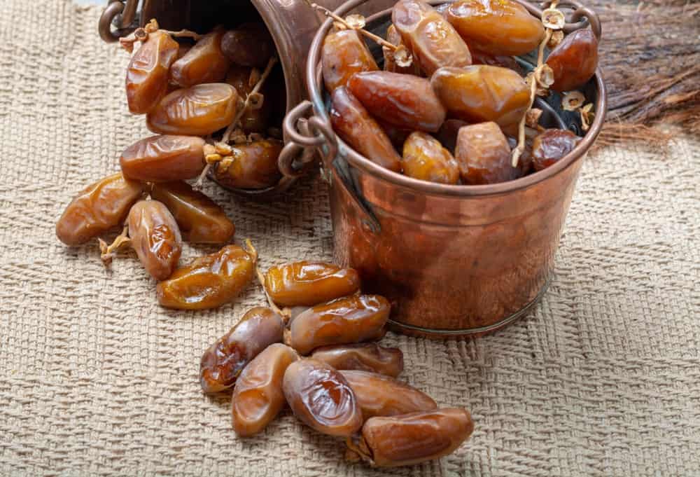 two tin pails of sweet succulent Semi-Soft Dates.