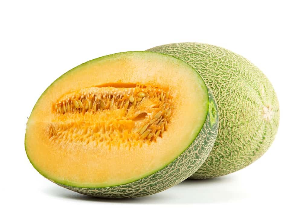 One and a half pieces of Hami melon with a yellow orange flesh.