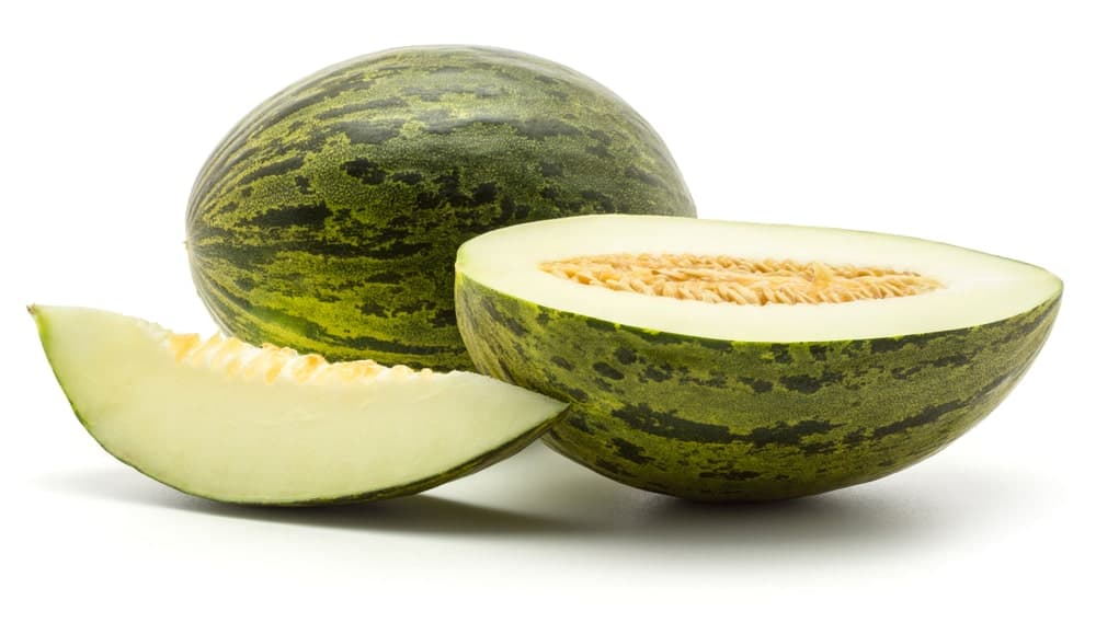 The white insides of a juicy Santa Clause Melon.