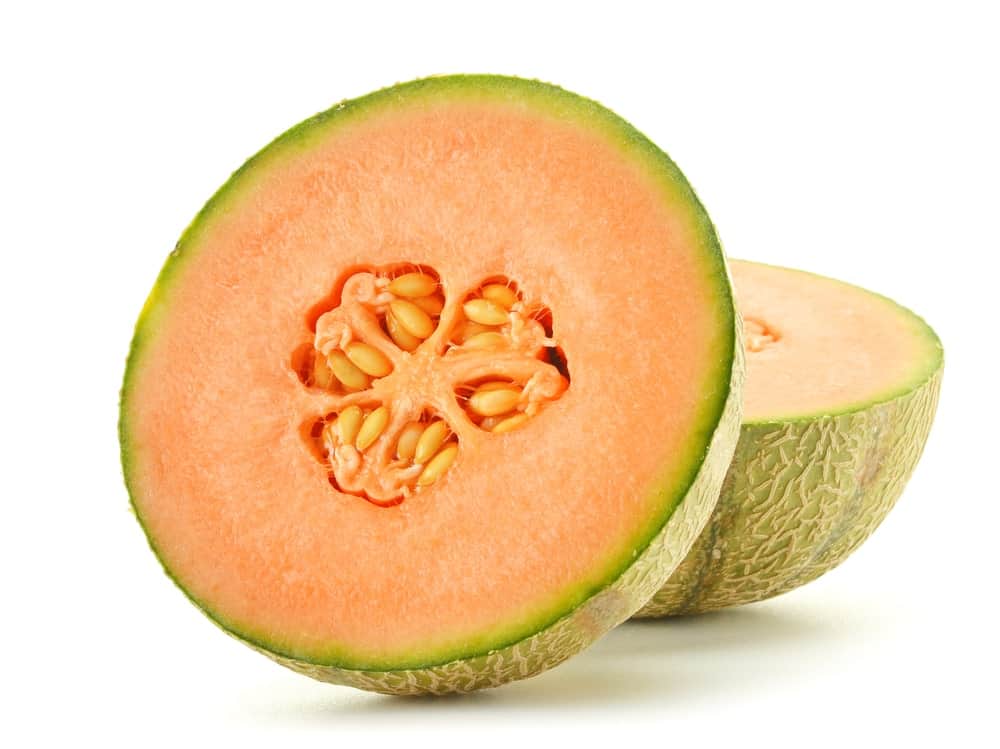 A sliced piece of juicy and sweet Sugar melon.