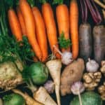 Carrots, parsley, turnip, and onions on display