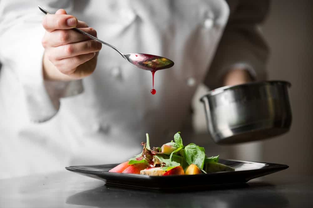 Chef preparing a dish.