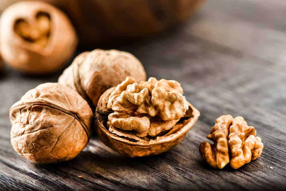 A close look at a few shelled walnuts.