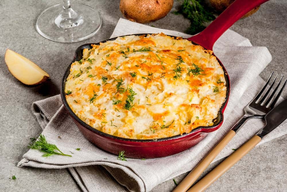 Freshly cooked vegan shepherd's pie in a skillet.