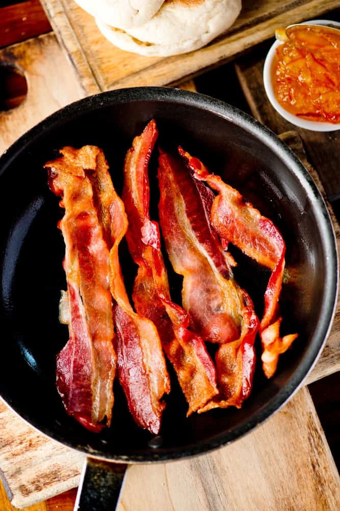 A pan of freshly-cooked chicken fried bacon.