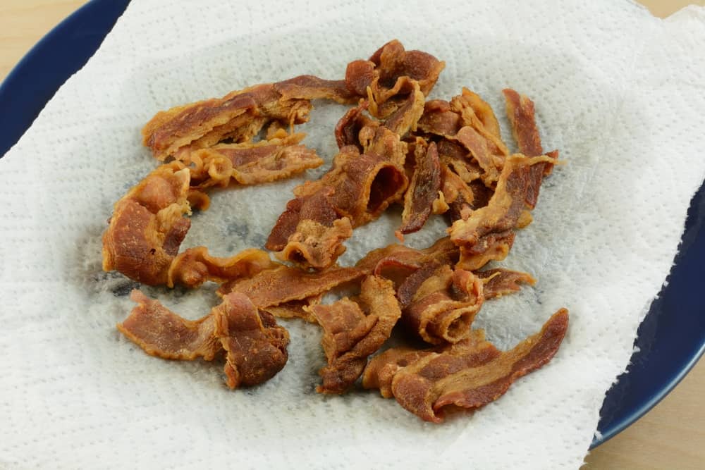 Pieces of bacon cooked in the microwave.