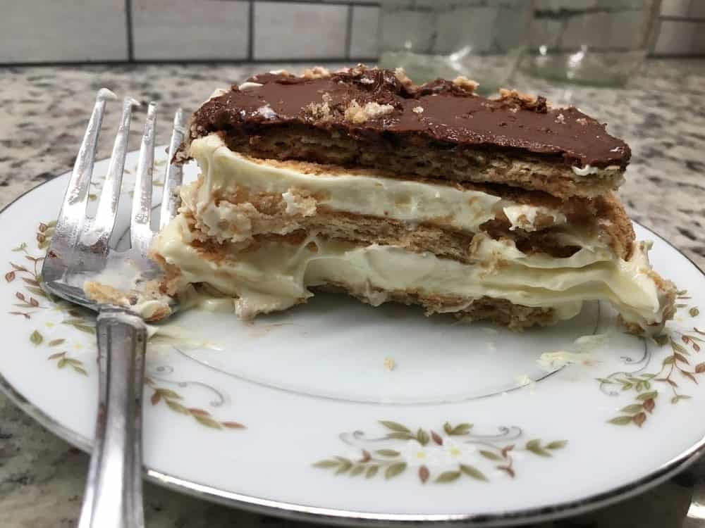 A slice of chocolate eclair cake on a plate.