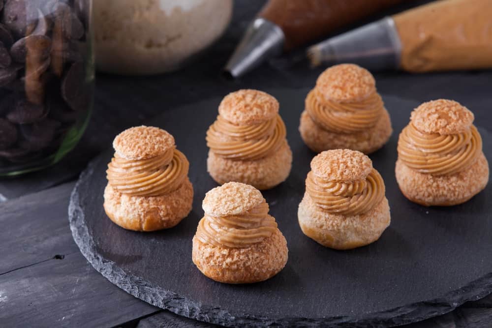 This is a set of freshly-baked choux pastries with caramel cream filling.