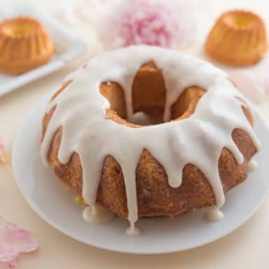 A freshly-made 7-up pound cake with drip frosting.