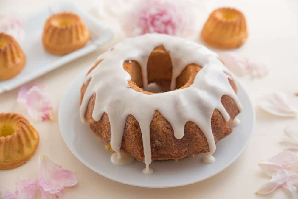 A freshly-made 7-up pound cake with drip frosting.