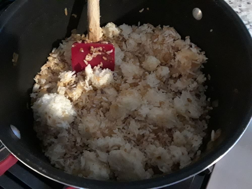 The rice is added into the pot.