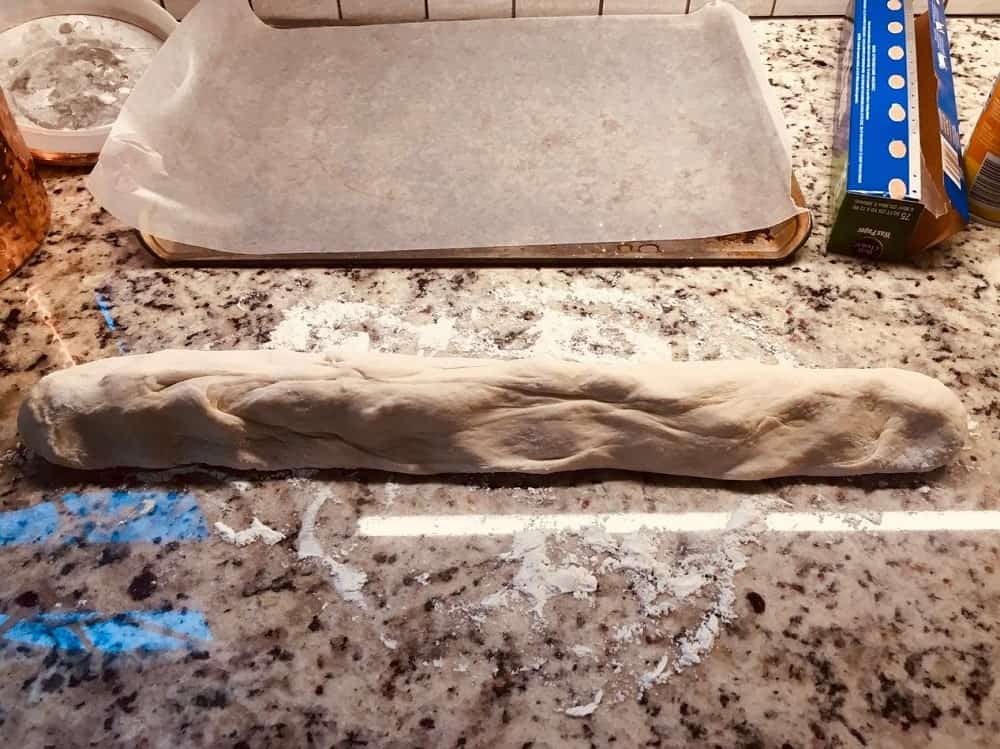 The dough is formed into one long piece.