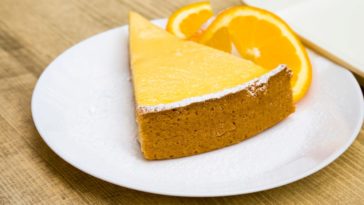 A look at a slice of orange creamsicle cheesecake.