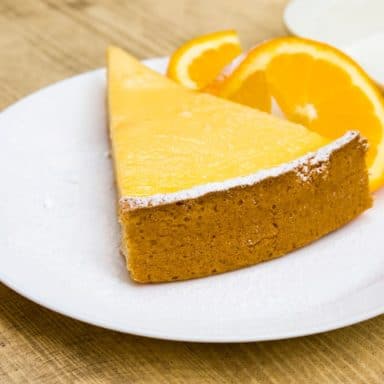 A look at a slice of orange creamsicle cheesecake.