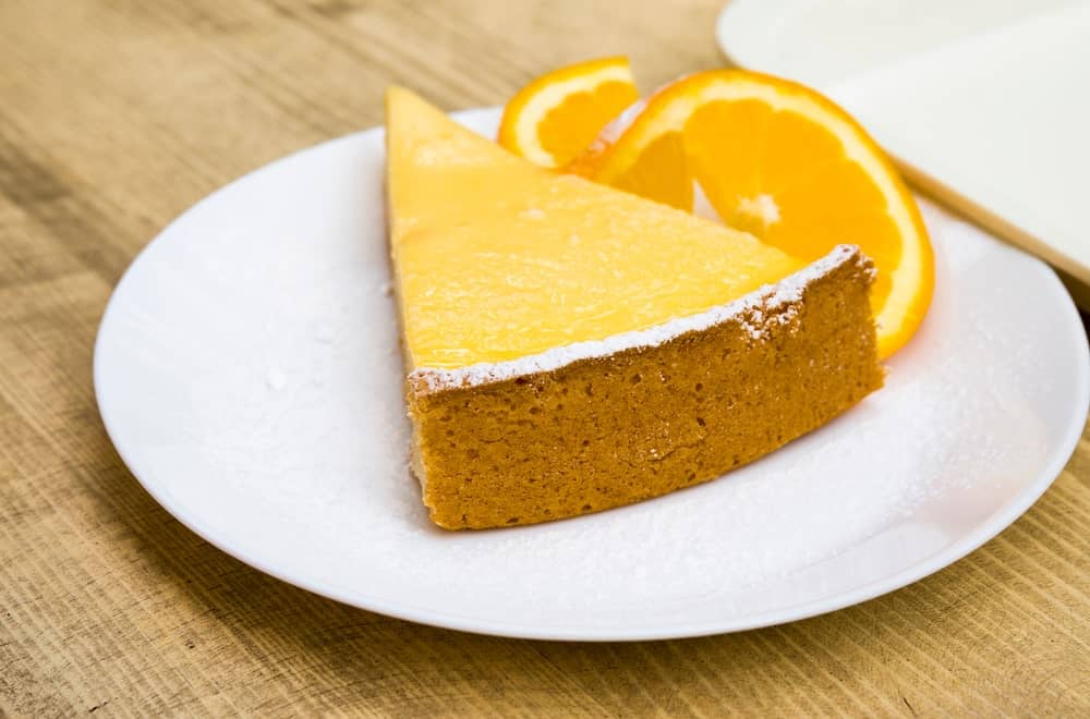 A look at a slice of orange creamsicle cheesecake.