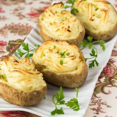 A plate of fresh twice-baked potatoes.