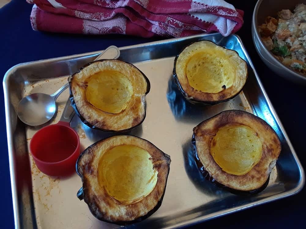 The baked acorn squash is ready to be filled.