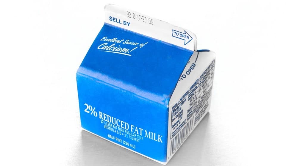 A half-pint carton of 2% milk.