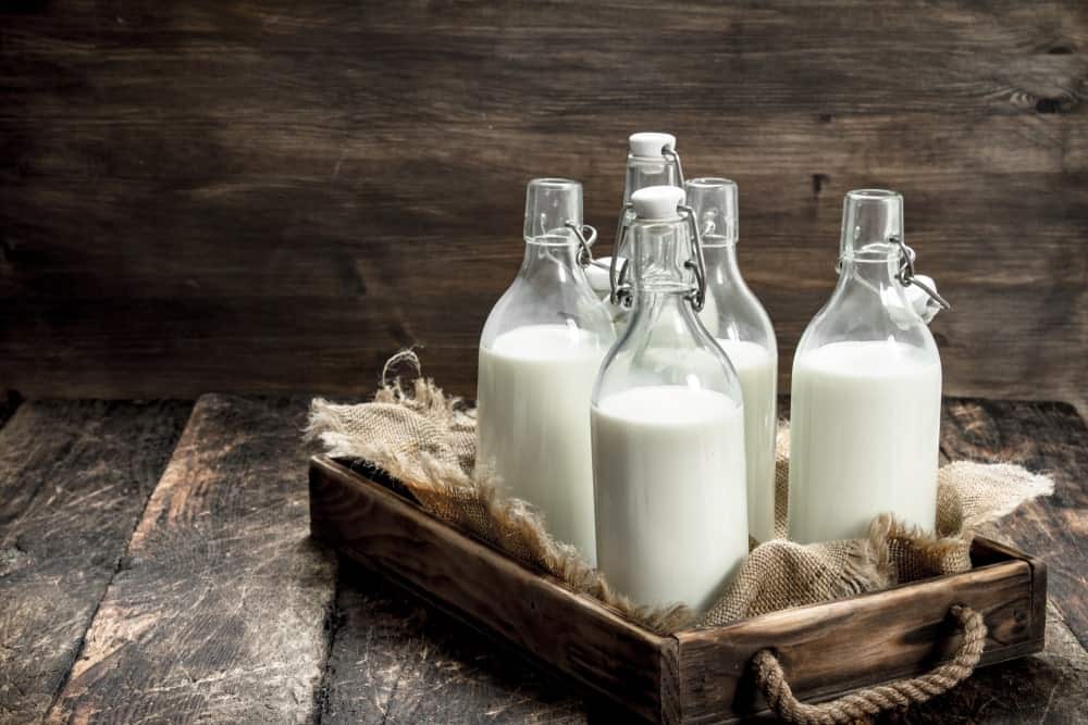 Glass bottles of organic milk.