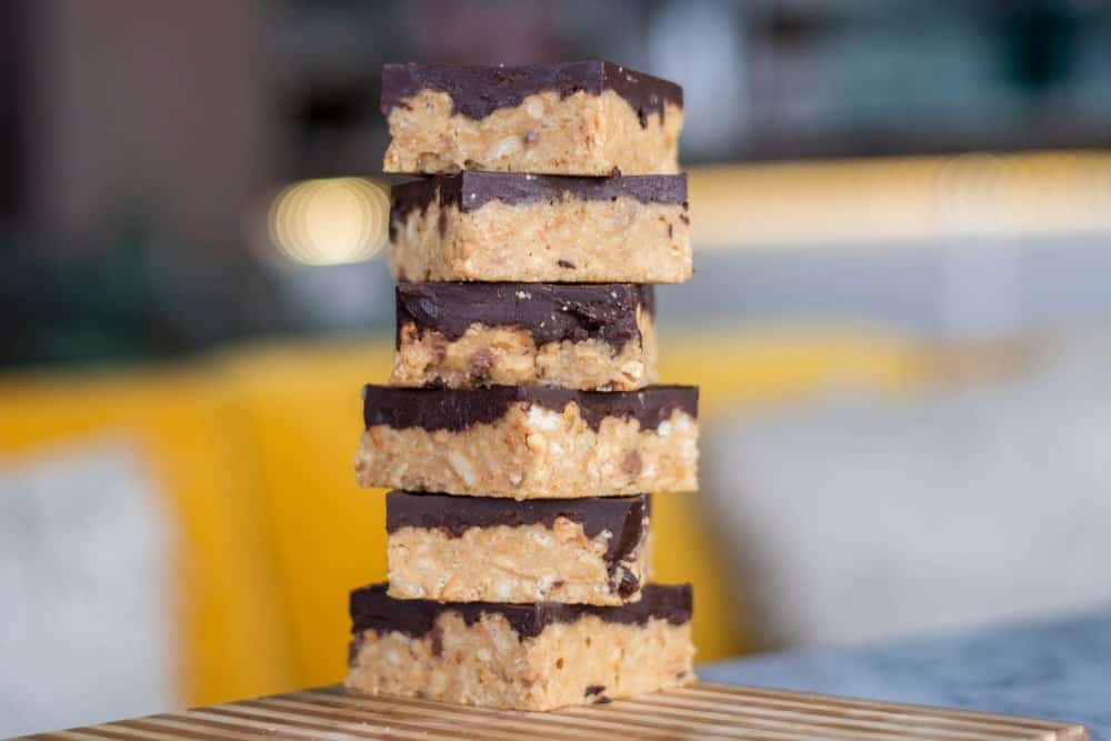 A stack of peanut butter cup crunch brownie bars.