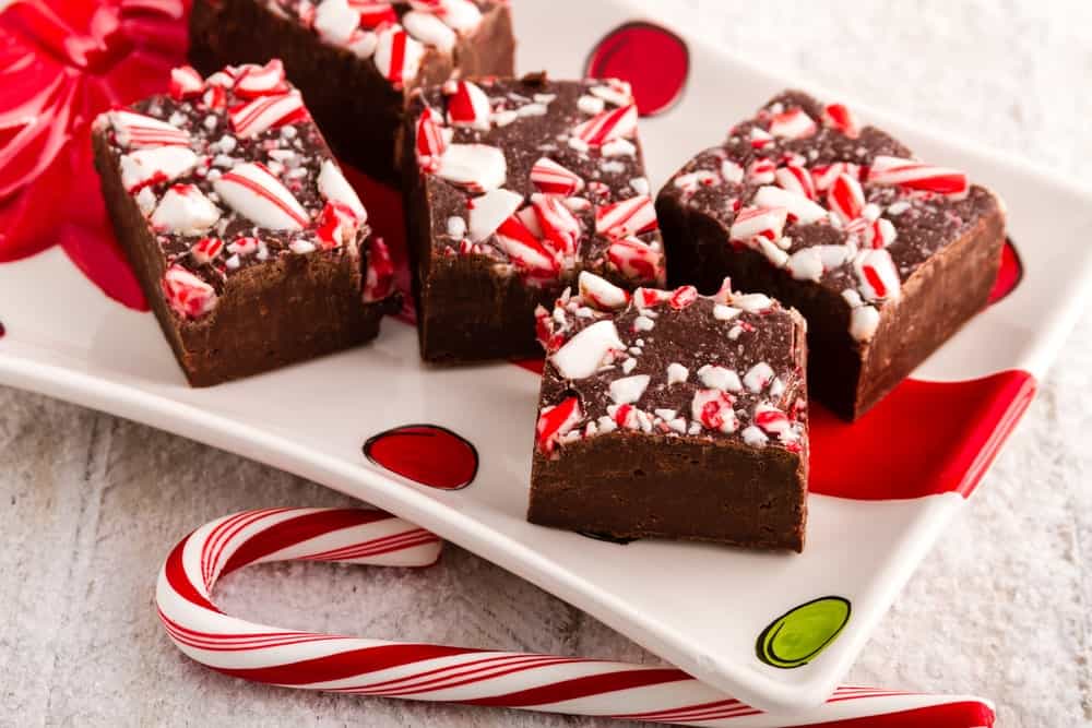 Pieces of peppermint brownies on a colorful plate.
