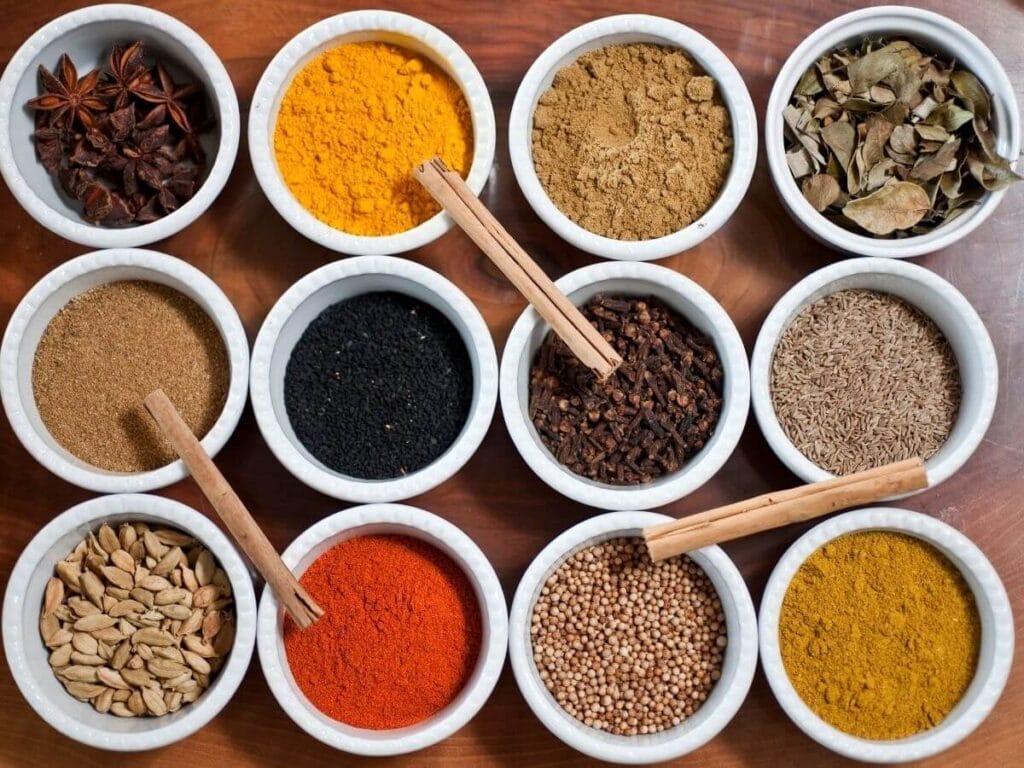 Various spices in small bowls