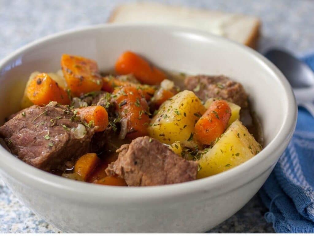 bowl of beef stew with carrots