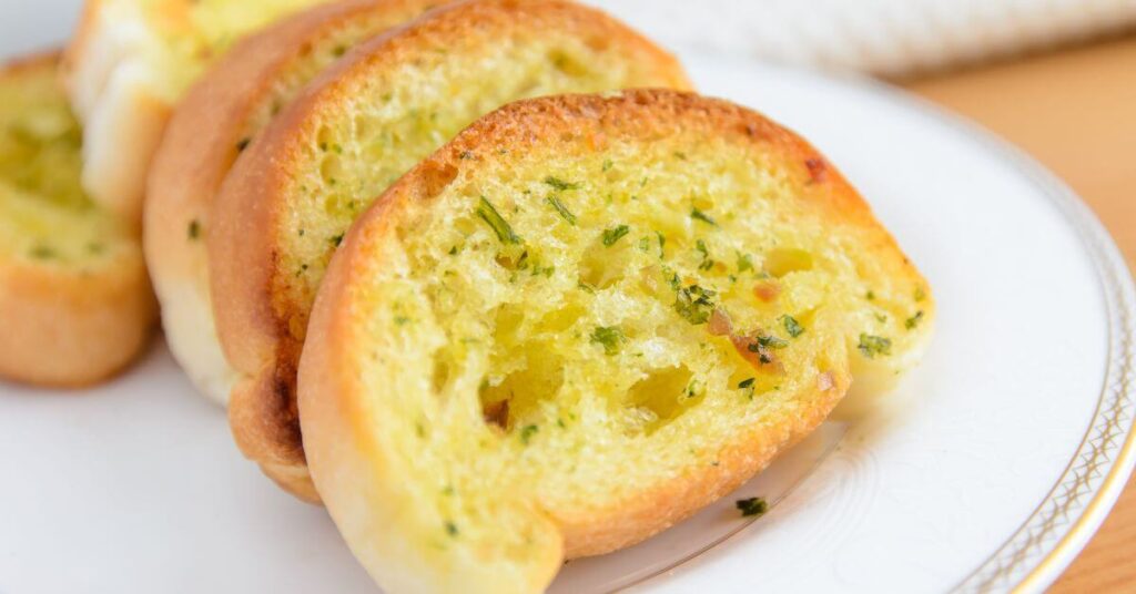 Plate of Garlic Bread made with Sliced Bread