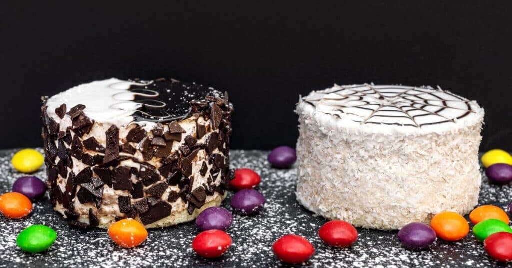 two store bought cakes with added candy toppings