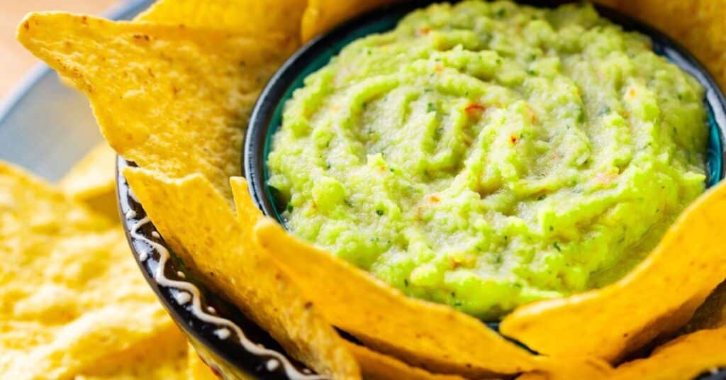 a bowl of guac made with one avocado