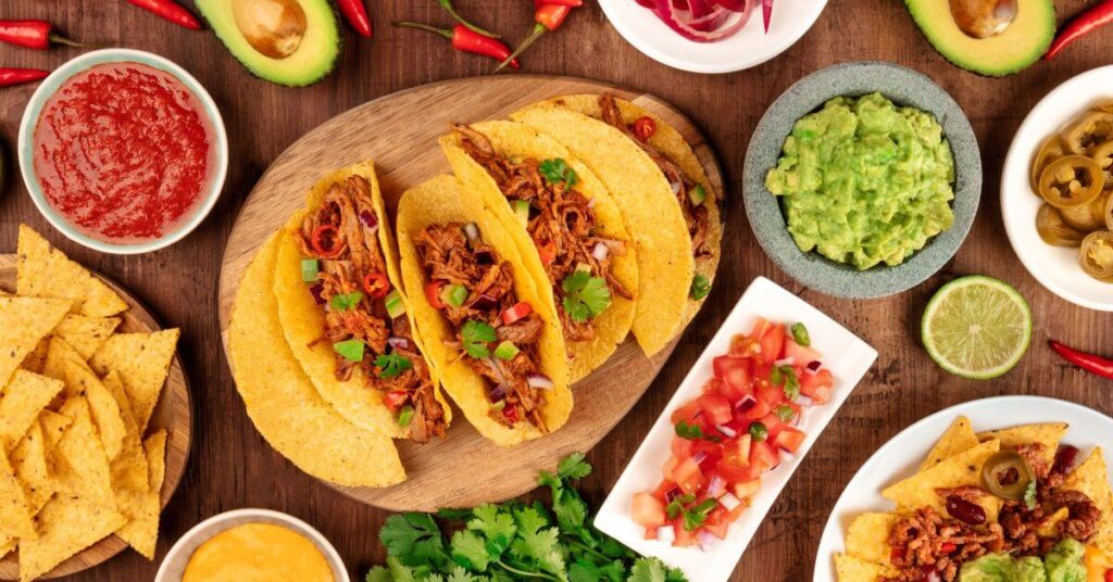 tacos with guac and salsa and chips