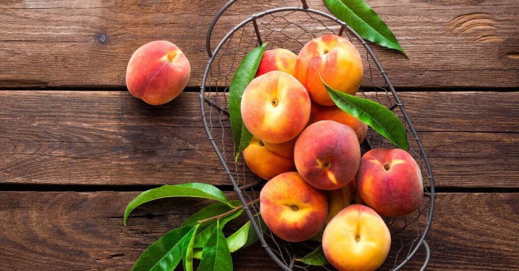 basket of sweet peaches
