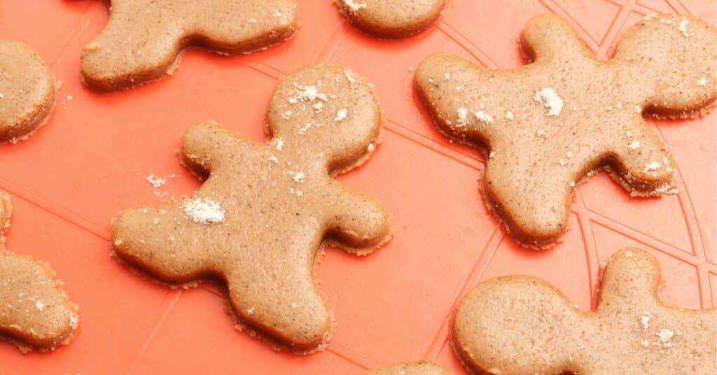 baking mat with gingerbread cookies on it