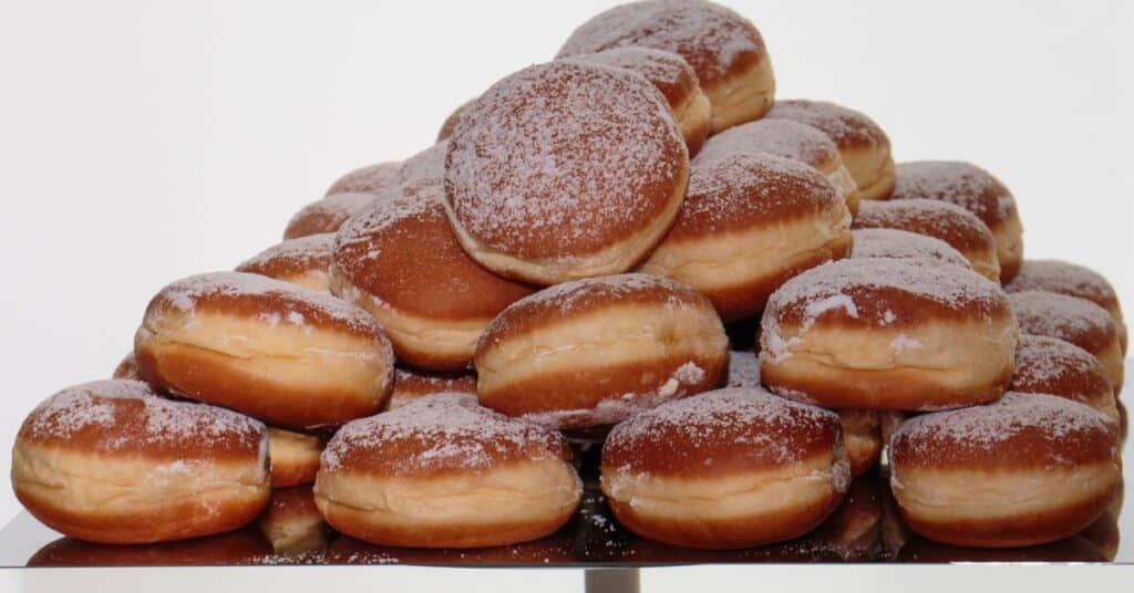 a bunch of Bavarian Cream Donuts 