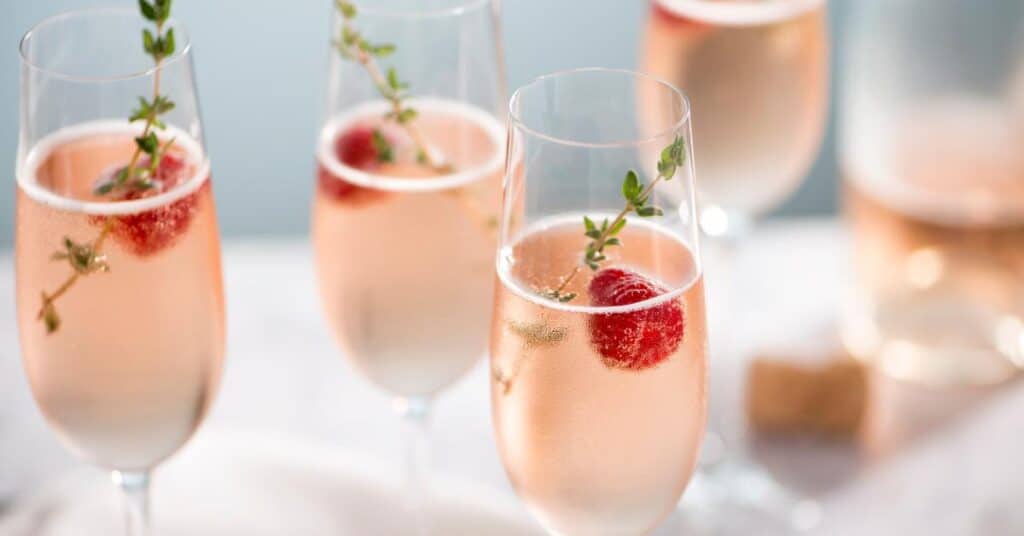 champagne with raspberries