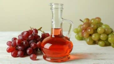 bottle of vinegar and grapes