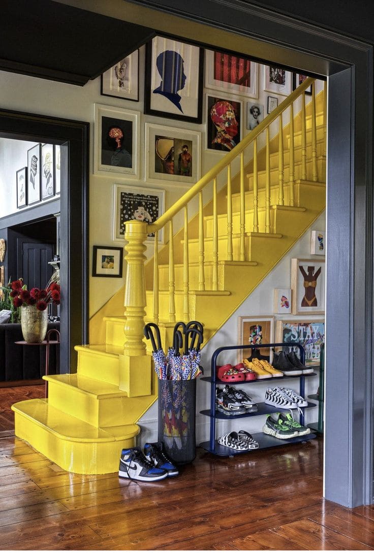 Vibrant Yellow Staircase with Gallery Wall Charm