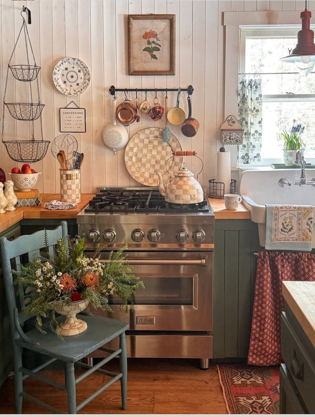Charming Cottage Kitchen with Vintage Florals and Copper Touches