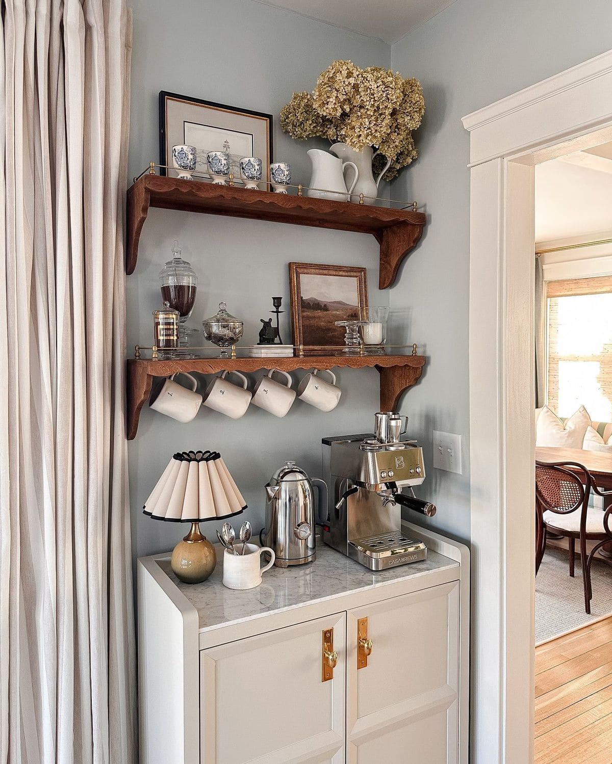 Elegant Coffee Nook with Vintage Details and Modern Comfort