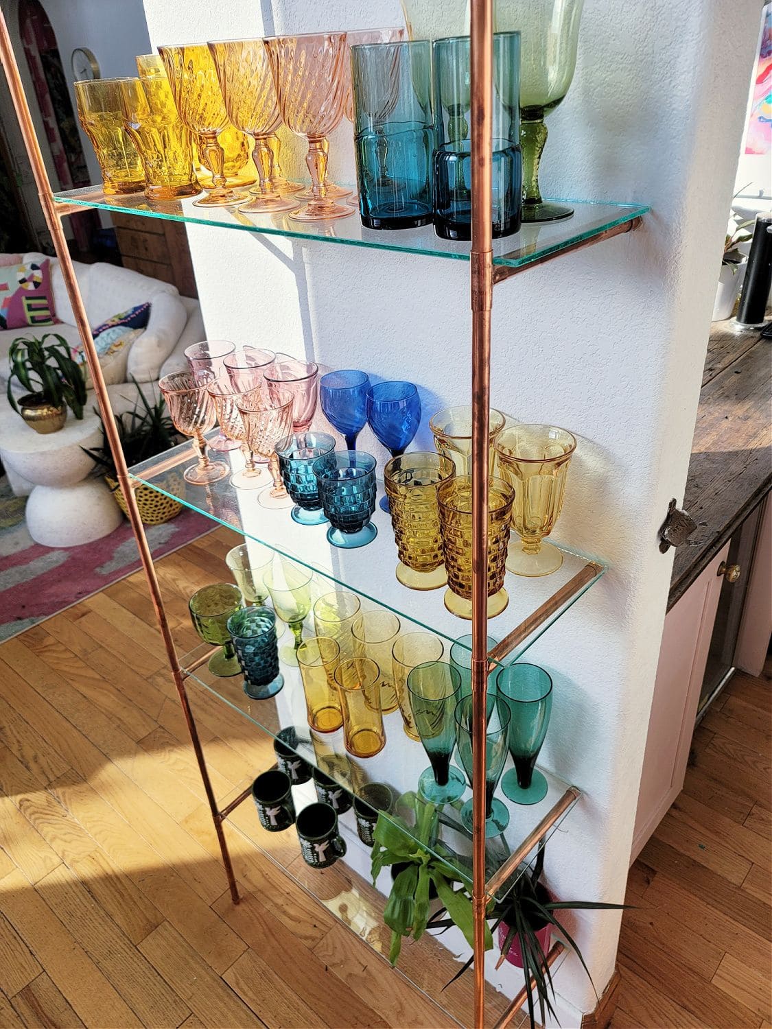 Glass Shelving with Color-Coordinated Goblets