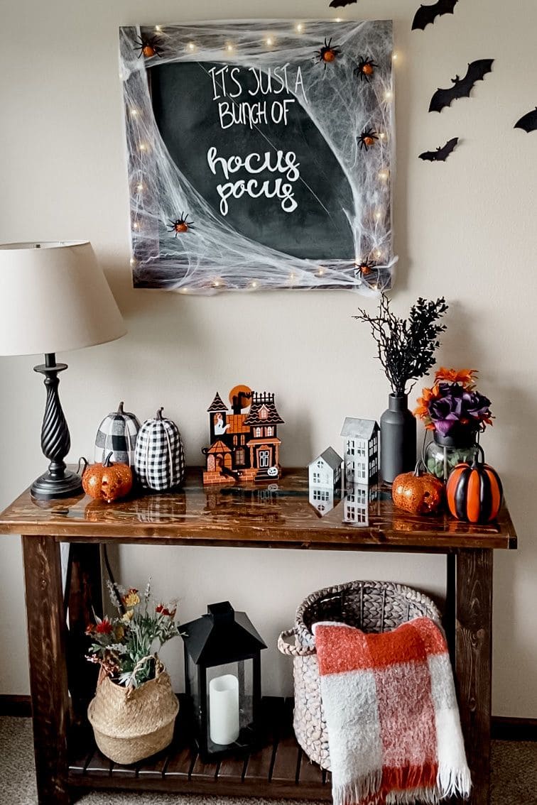 Charming Halloween Console Table Decor with a Playful Hocus Pocus Twist