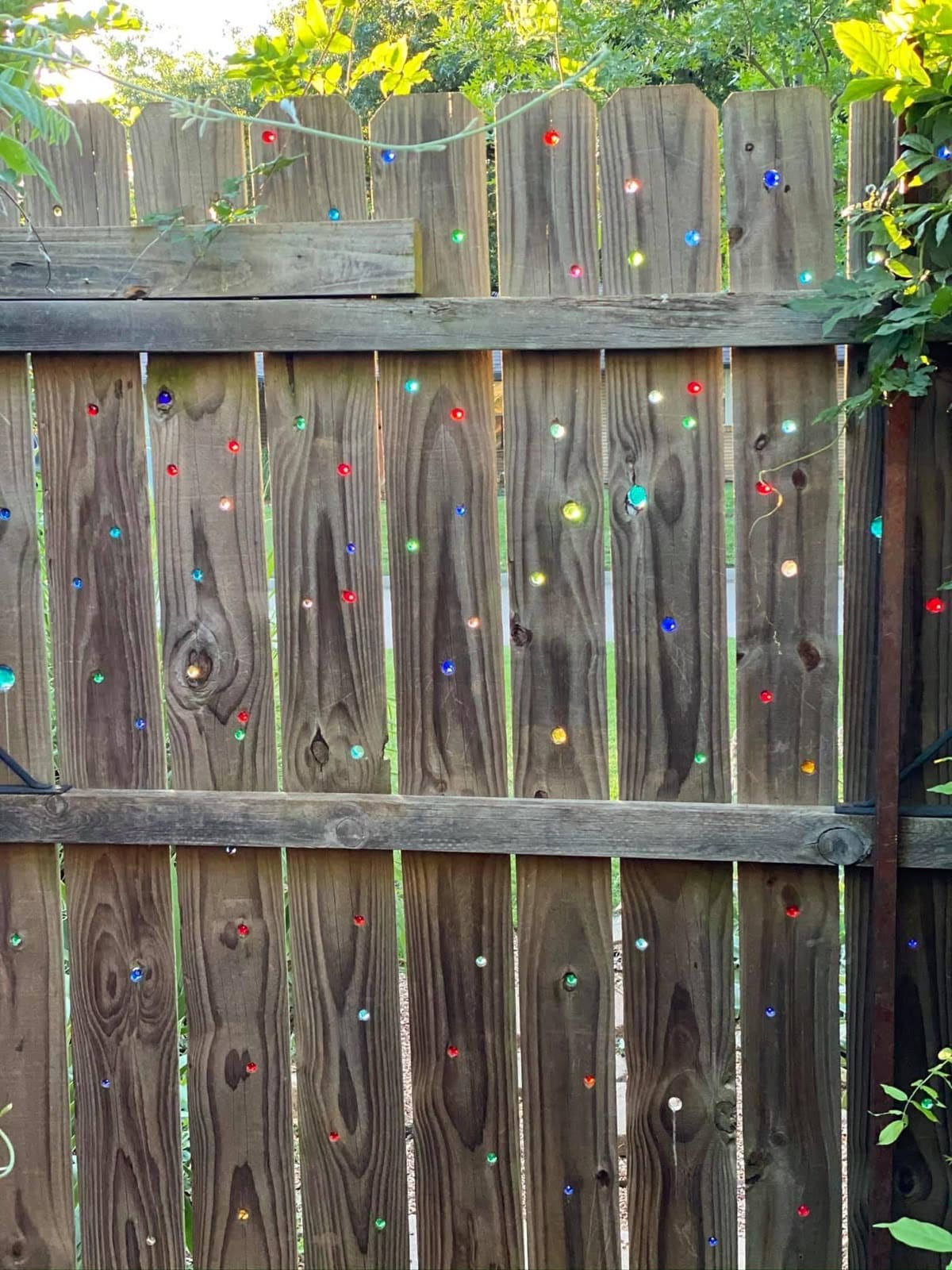 Whimsical Jewel-Studded Fence Design