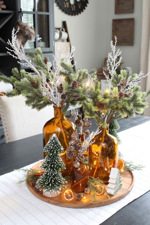 Amber Bottle Evergreen Centerpiece