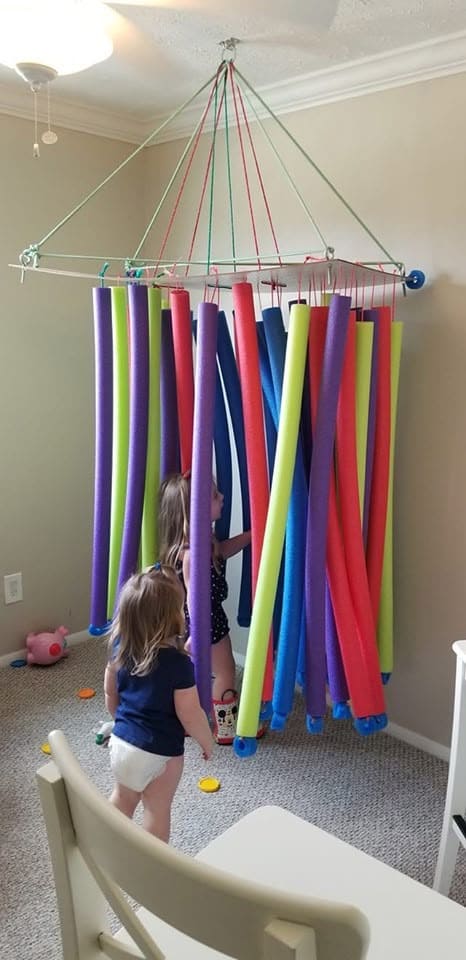 DIY Pool Noodle Sensory Curtain