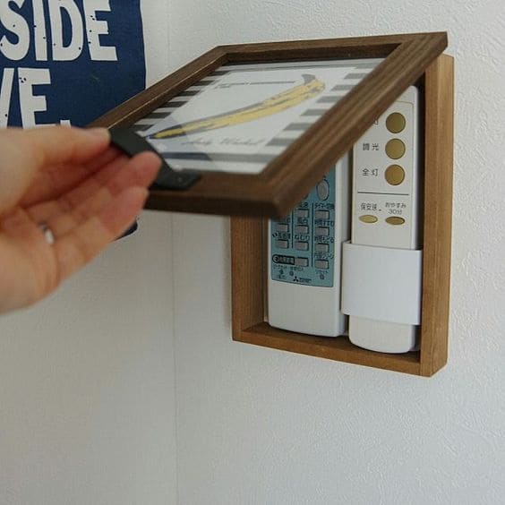 Hidden Frame Remote Holder