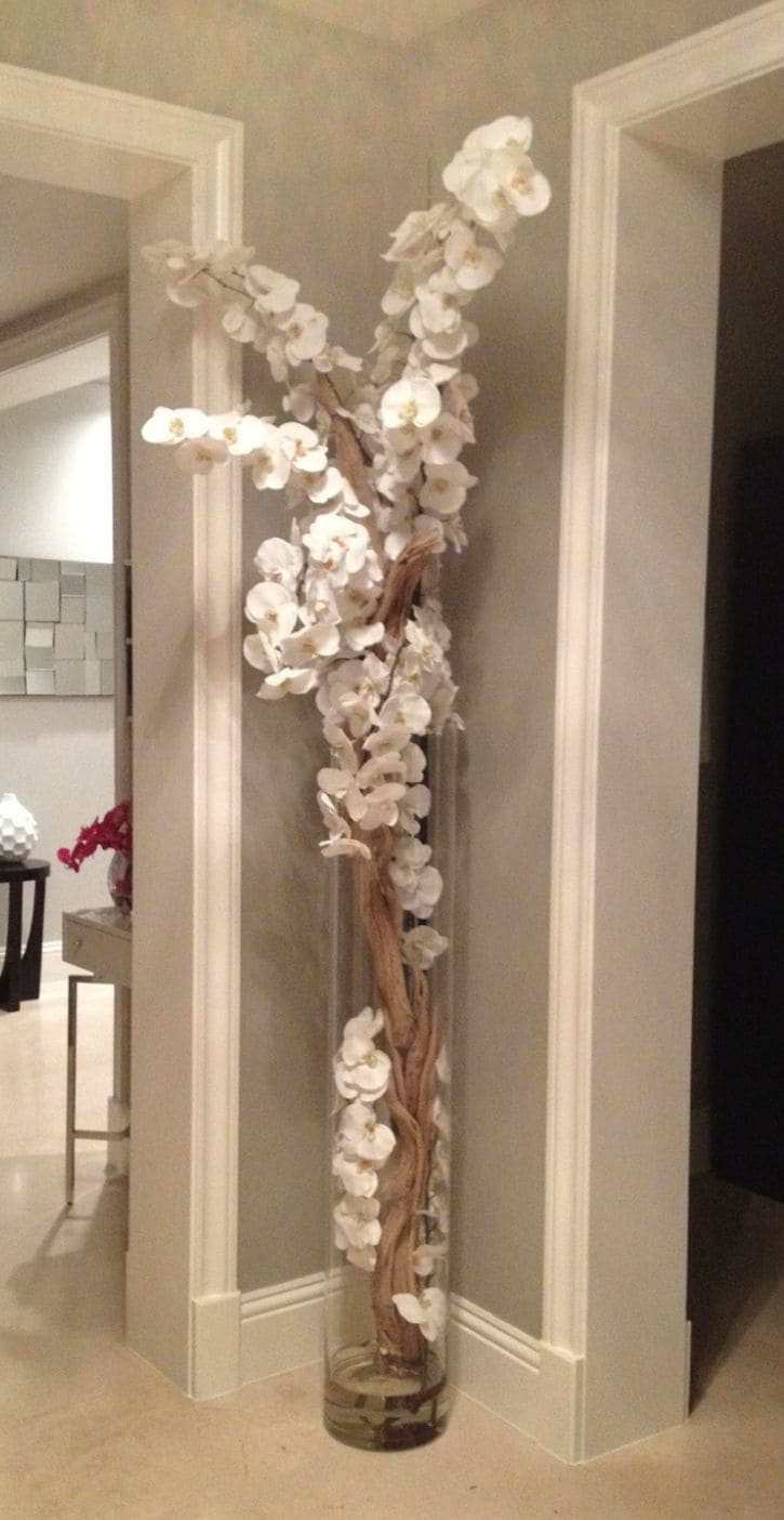 Tall Glass Vase with Orchids and Driftwood